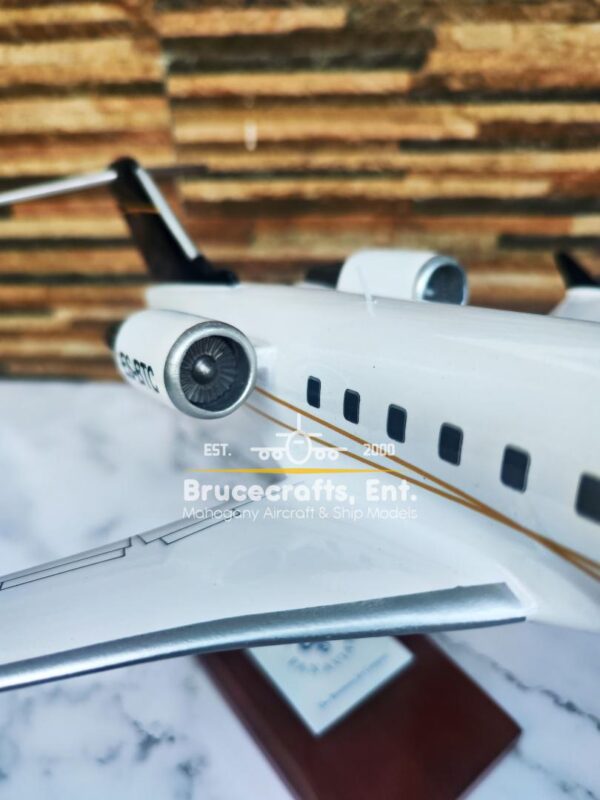 Model of Bombardier Challenger 605 with detailed craftsmanship.